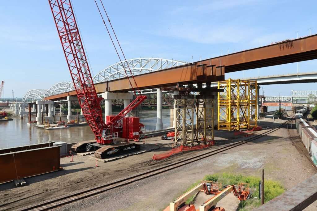 Crane and steel bridge girders on a bridge construction site